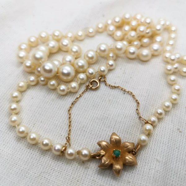 collar de perlas broche turquesa